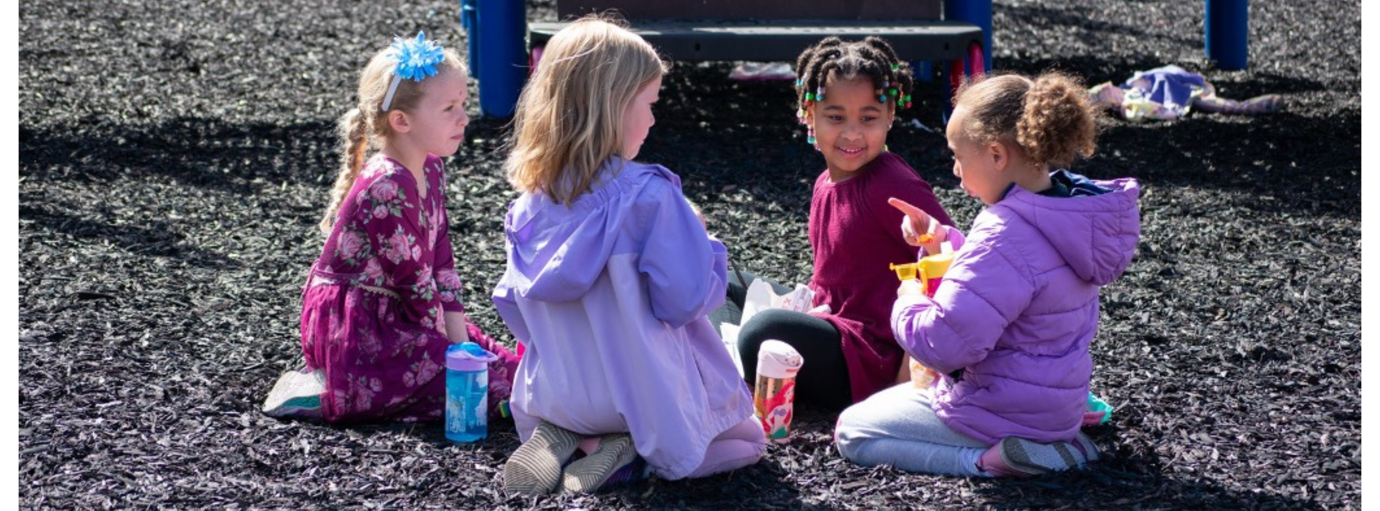 Camp Fire Alaska - Blog Image_ Storytelling - Inclusive by Nature_ an image of a diverse group of young girls bonding over lunch